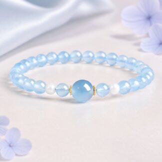 Aqualume Blue Focal Bracelet — 6 mm, pale-blue finished stretch bracelet shown in full