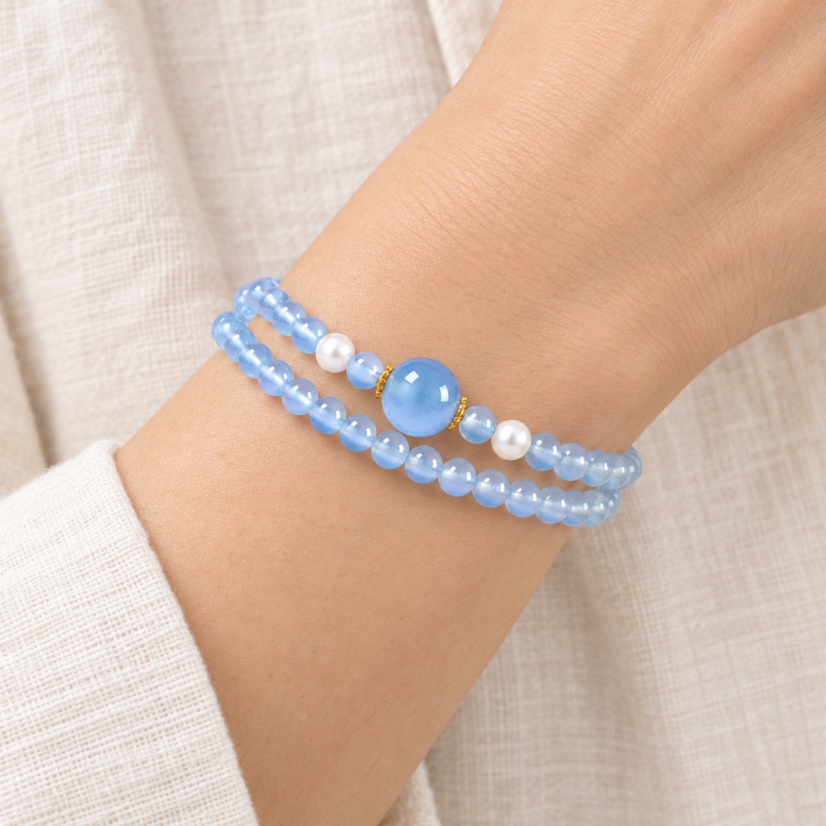 Aqualume Double-Wrap Blue Bead Bracelet — 5 mm worn on wrist