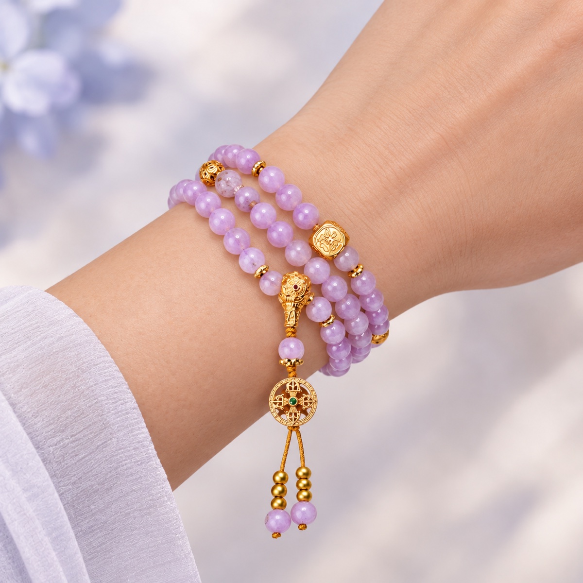 Verselle Lilac Medallion Necklace & Wrap Bracelet worn on wrist