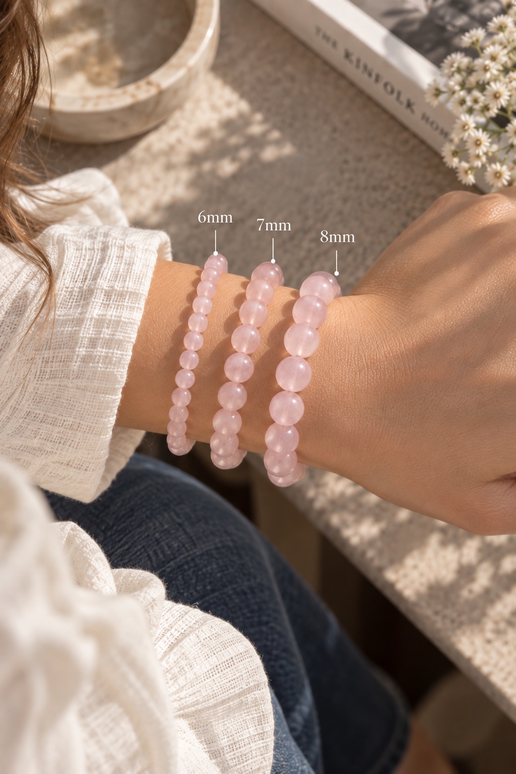 Illustration of pink bead bracelets labeled 6mm, 7mm, and 8mm