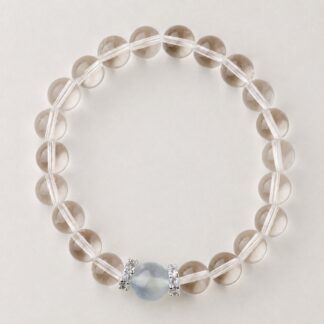 Single clear round-bead bracelet with pale blue focal accent, approximately 8 mm beads