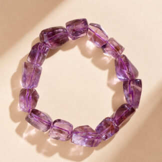 Overhead view of Violet Drift purple nugget stretch bracelet with polished irregular beads.